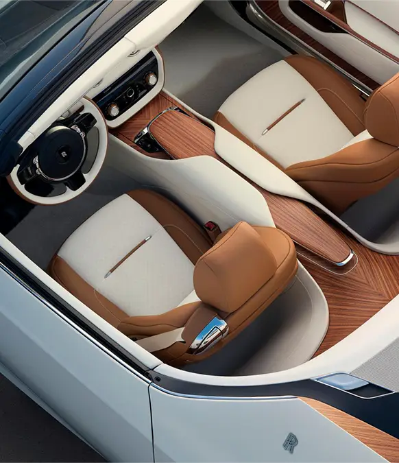 The wood design took 8,000 hours to construct / The Rolls-Royce features a bespoke watch design / Rolls-Royce Motor Cars