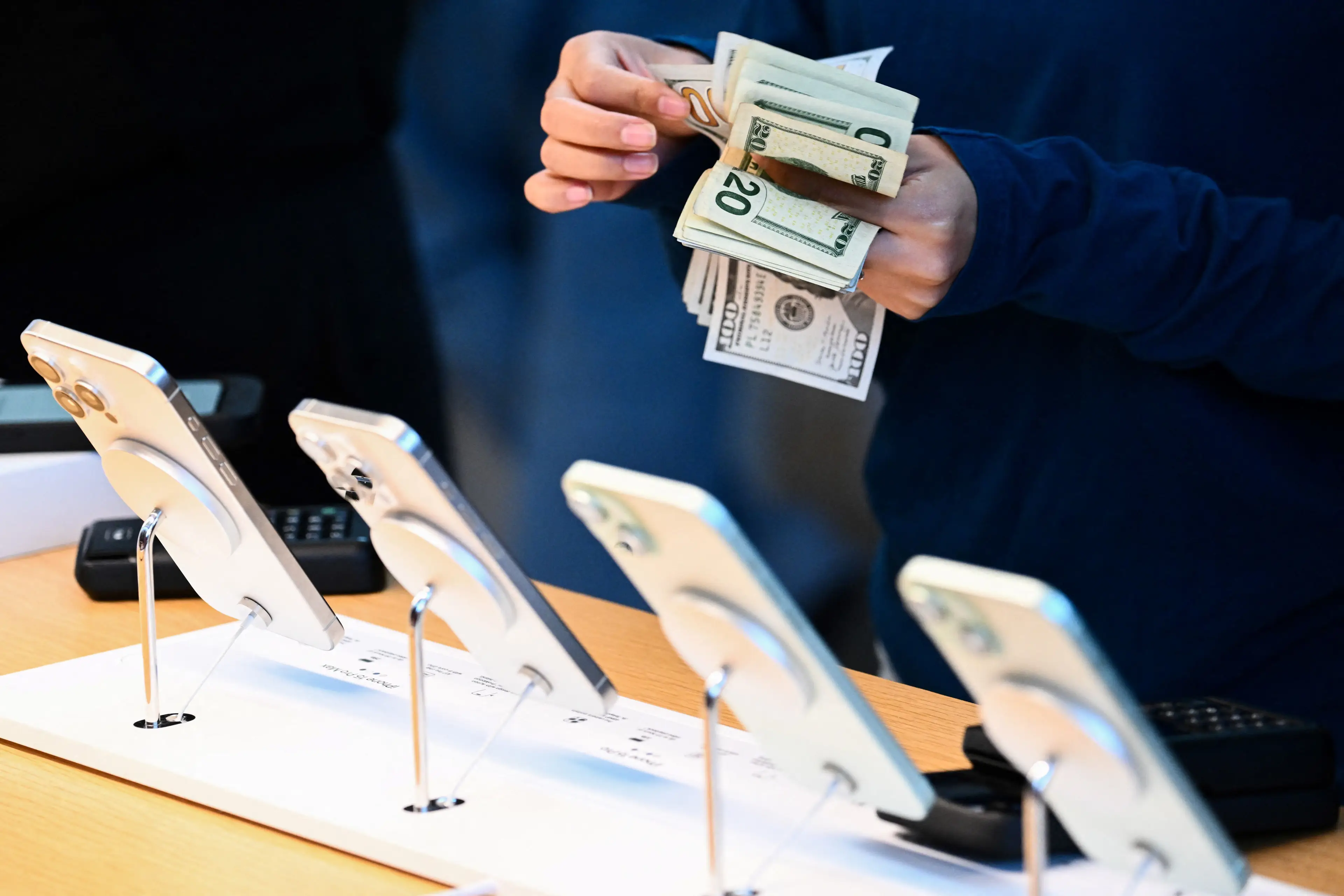 Buying a new iPhone can cost some serious money (PATRICK T. FALLON / Contributor / Getty)