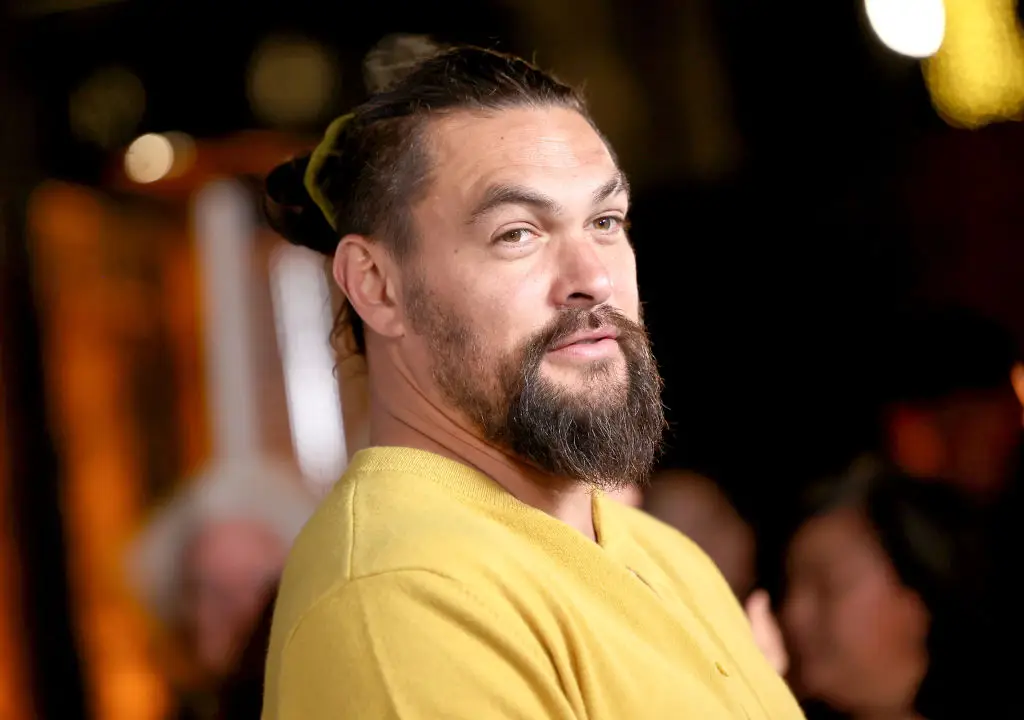One woman was scammed out of $105,000 after a scammer pretended to be Jason Momoa (Amy Sussman/Getty Images)