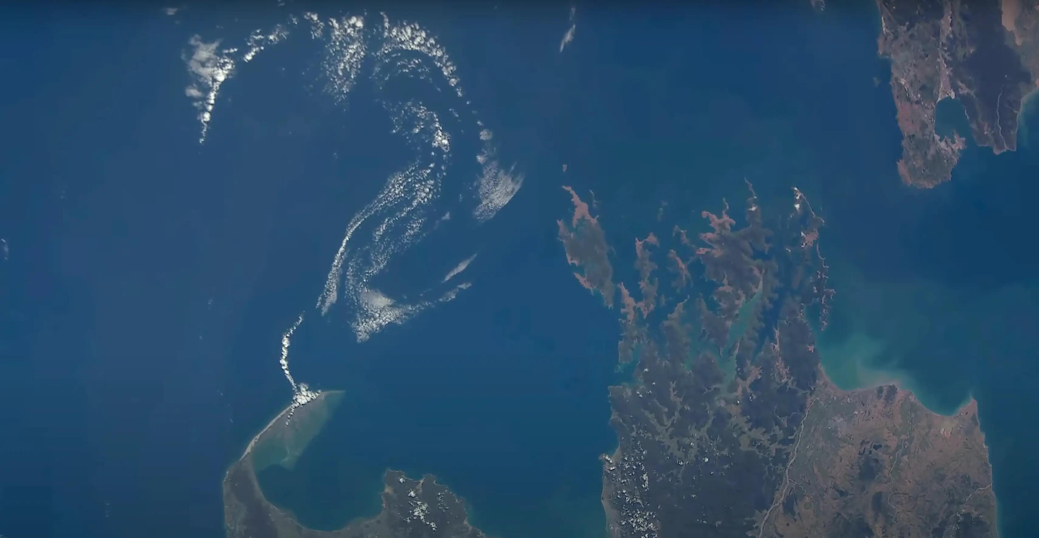 The footage is captured from the International Space Station (Sen)