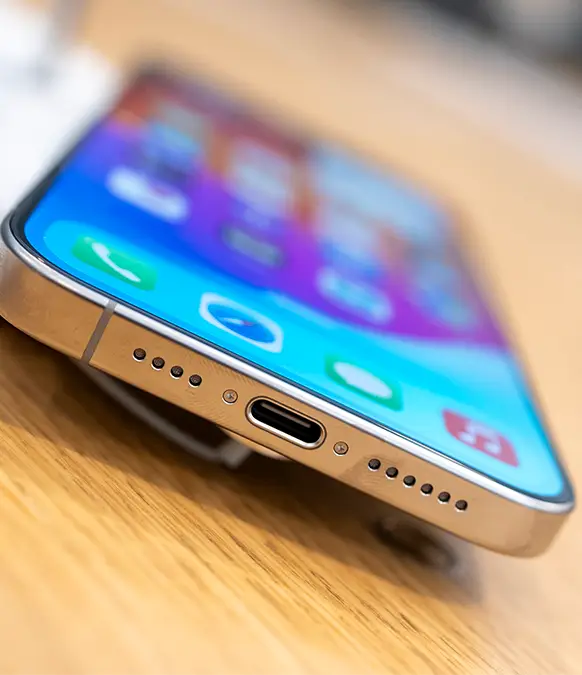 Clean out the dust in the charging port with a cocktail stick / Ming Yeung / Staff / Getty