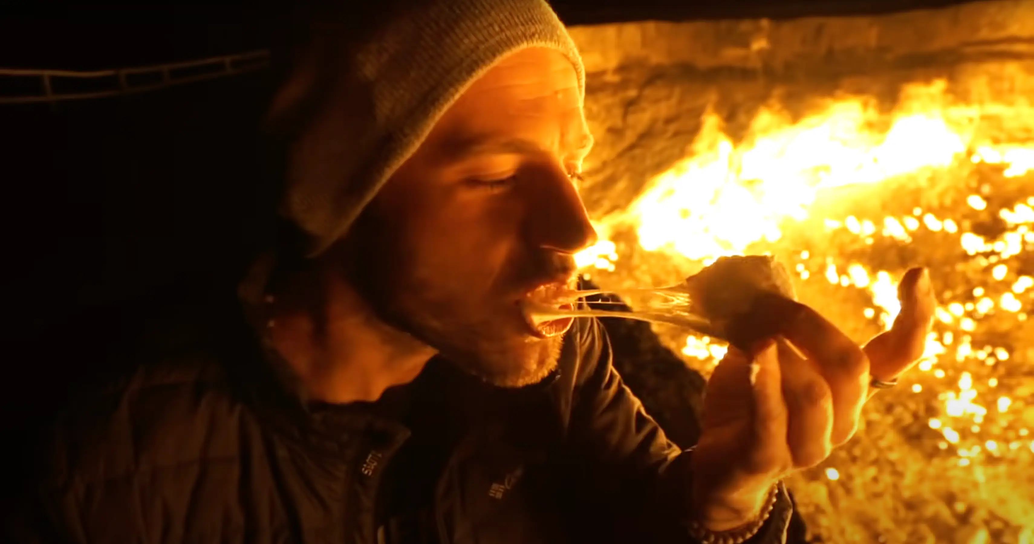 Mike Corey enjoyed a "perfect" marshmallow next to the giant sinkhole (YouTube/@fearlessandfar)