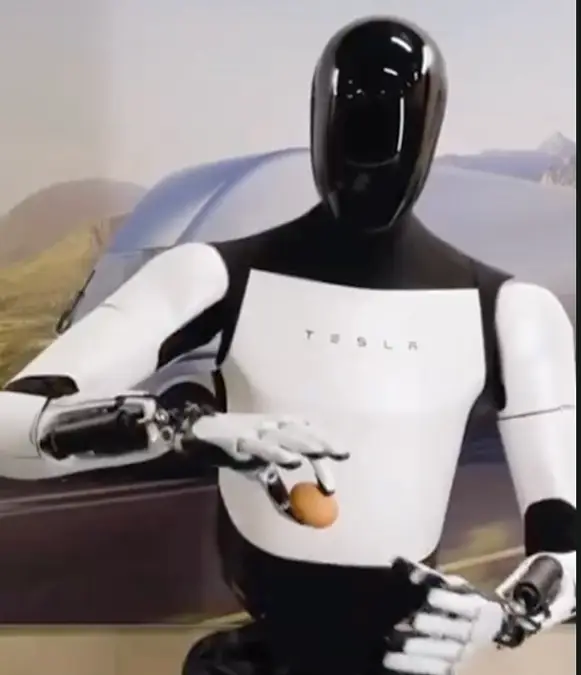 Optimus is capable of handling delicate objects with care like an egg / Tesla Optimus / X
