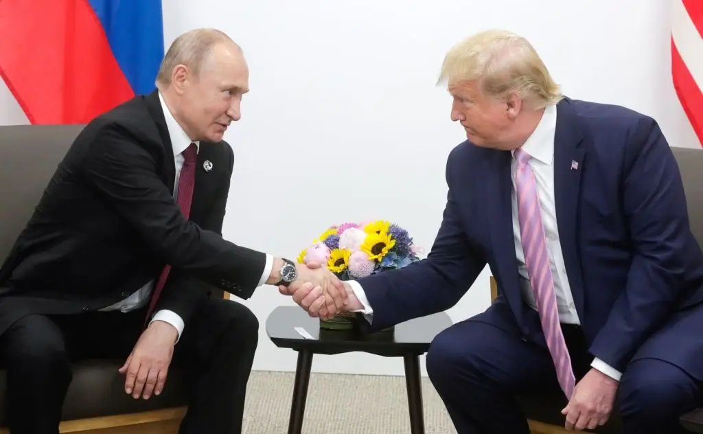 Trump's relationship with Putin has made him a strong target for Anonymous (Kremlin Press Office / Handout/Anadolu Agency/Getty Images)