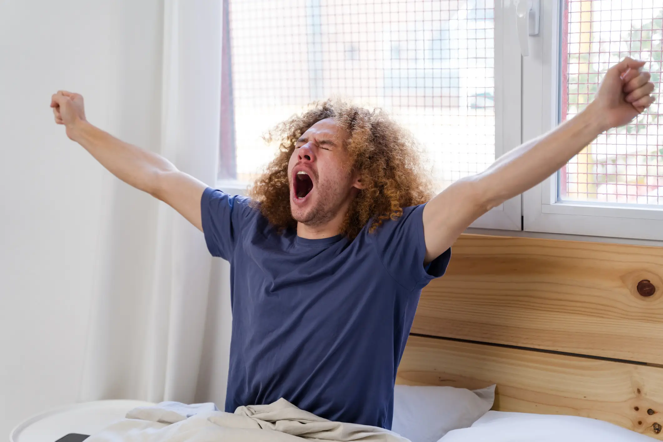Yawning has a surprisingly powerful role in the body (Creative Images Lab/Getty)