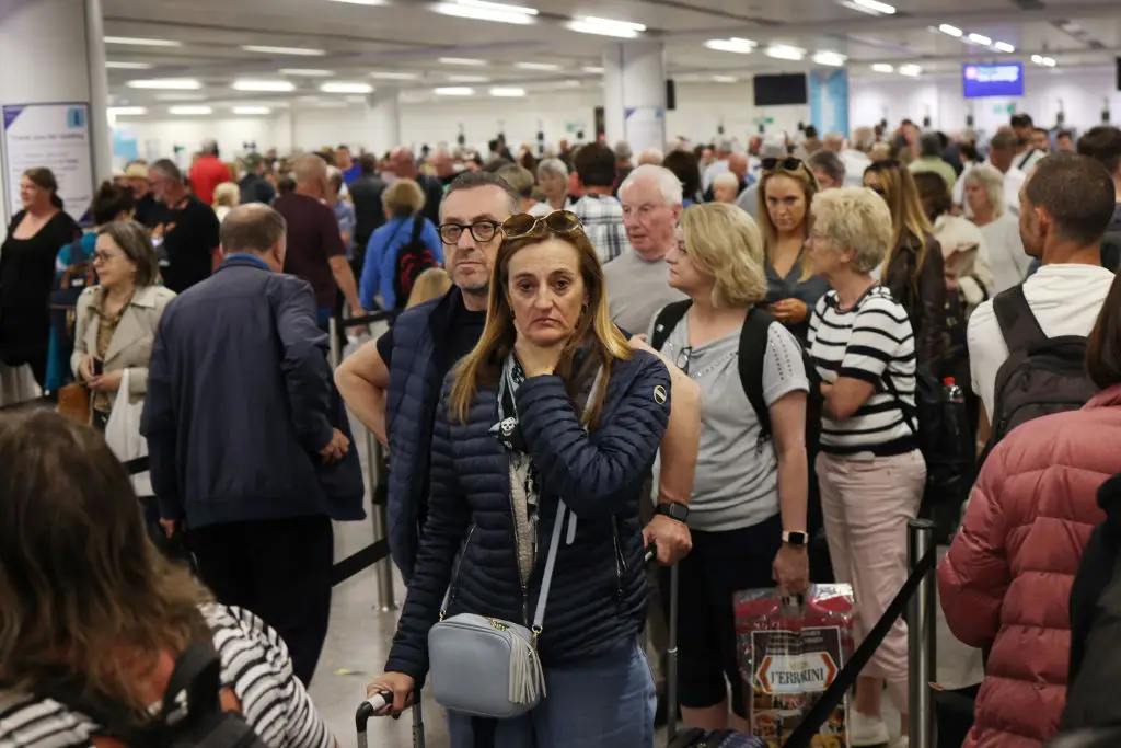 Travel experts have advised passengers to arrive at airports around four hours before their flight (Dan Kitwood/Getty Images)