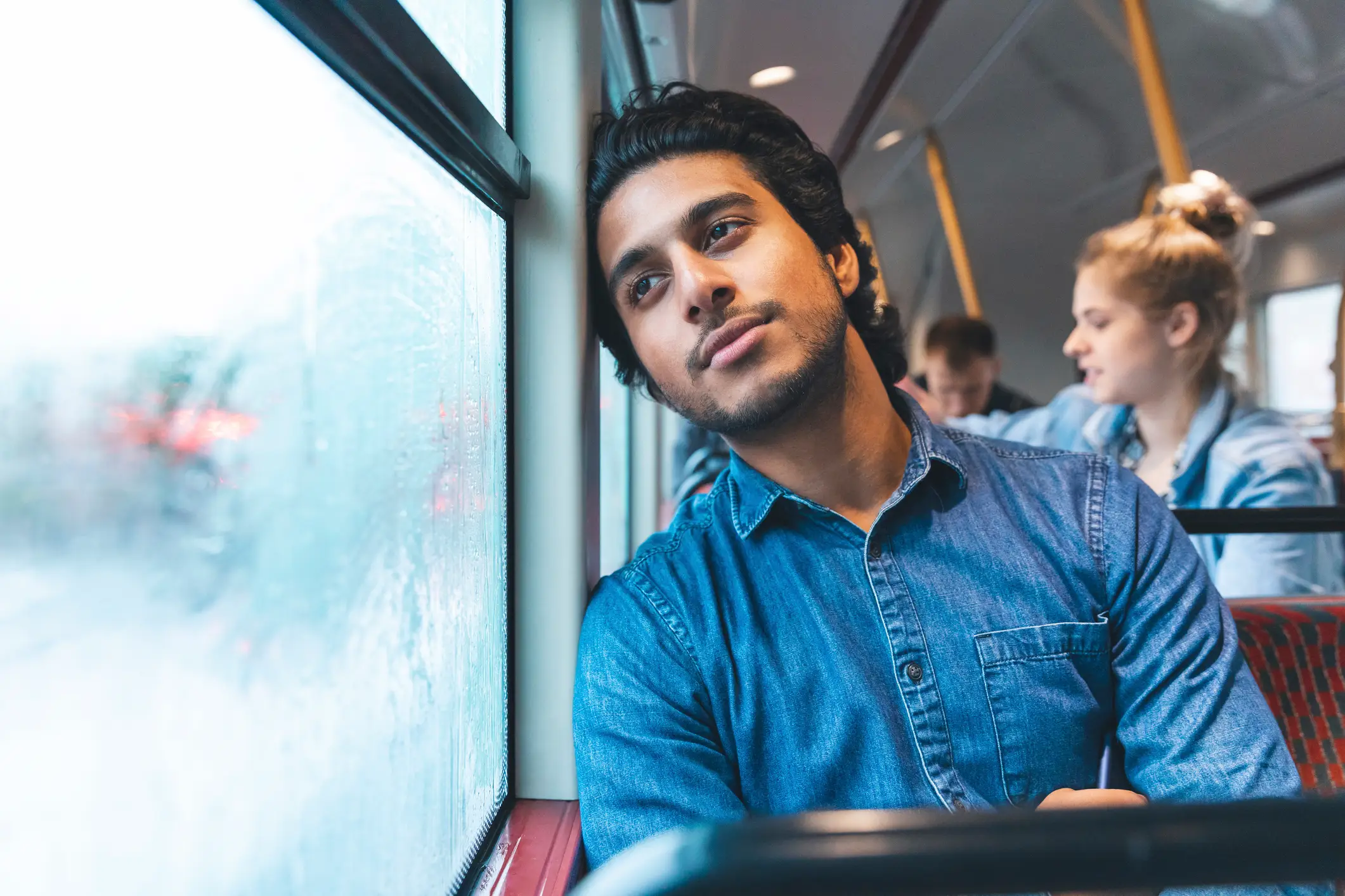Have a look at the black dots next time you're on a bus or train. (Westend61/Getty)