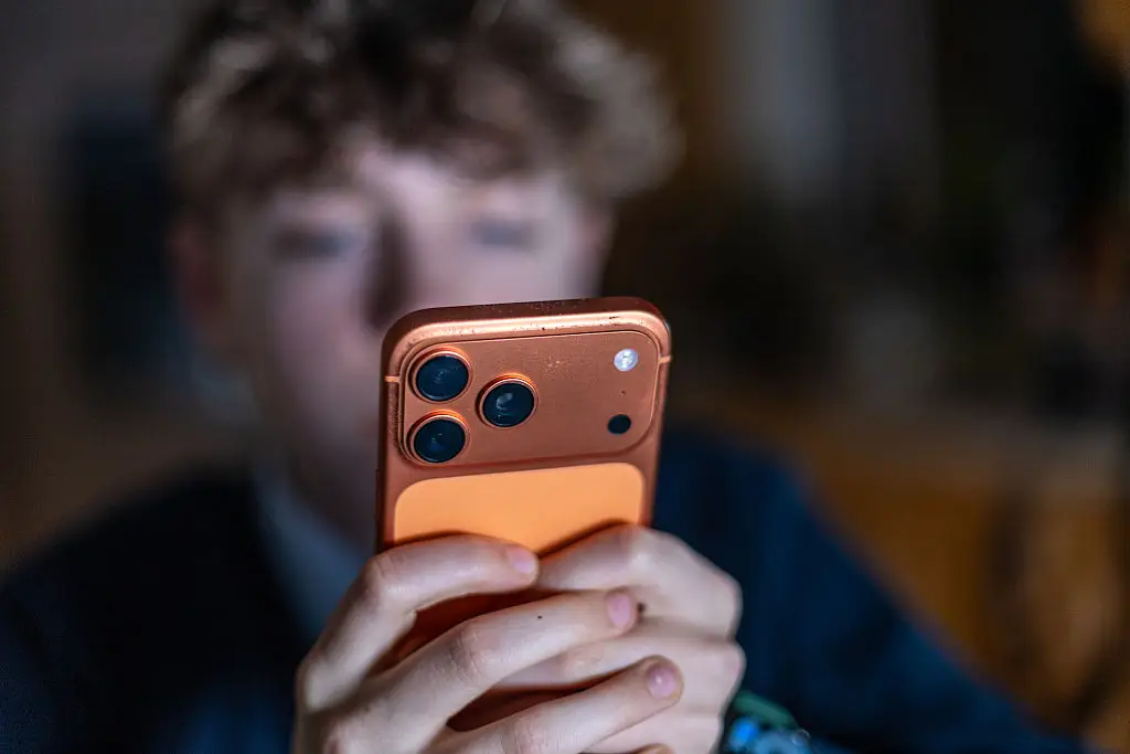 This would require every action taken by a child on their phone to be scanned by the manufacturer (Anna Barclay/Getty Images)