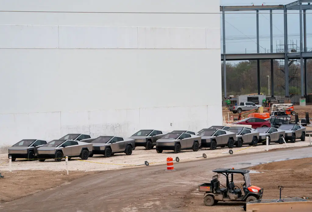Unsold Tesla vehicles have been left waiting outside factories (SUZANNE CORDEIRO/AFP via Getty Images)
