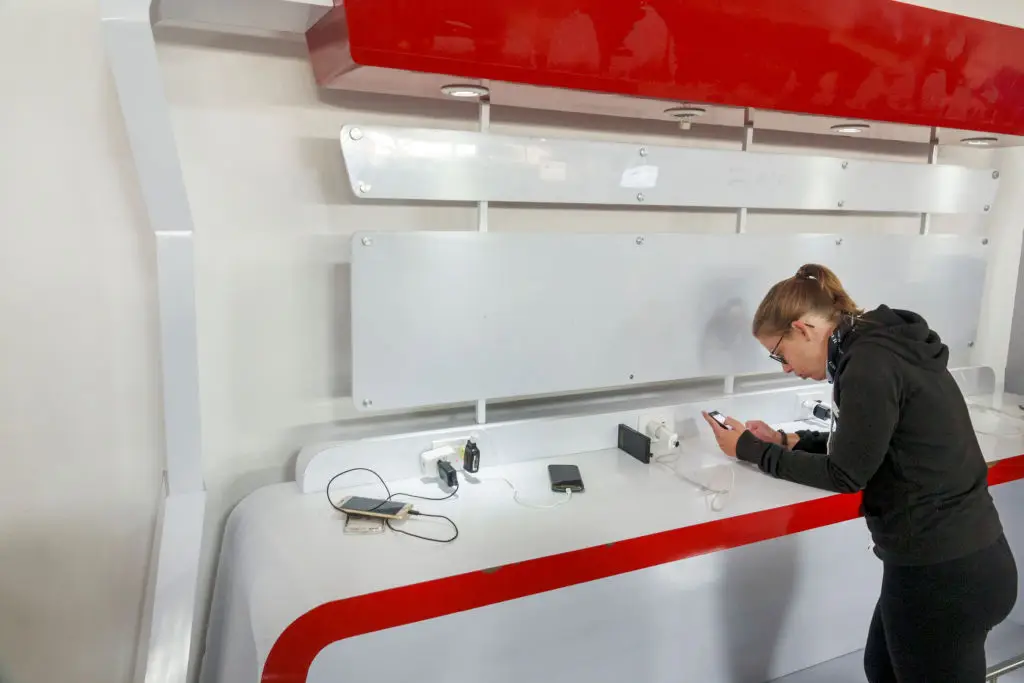 A woman using a charging station at Rafael Nunez International Airport (Getty Images)