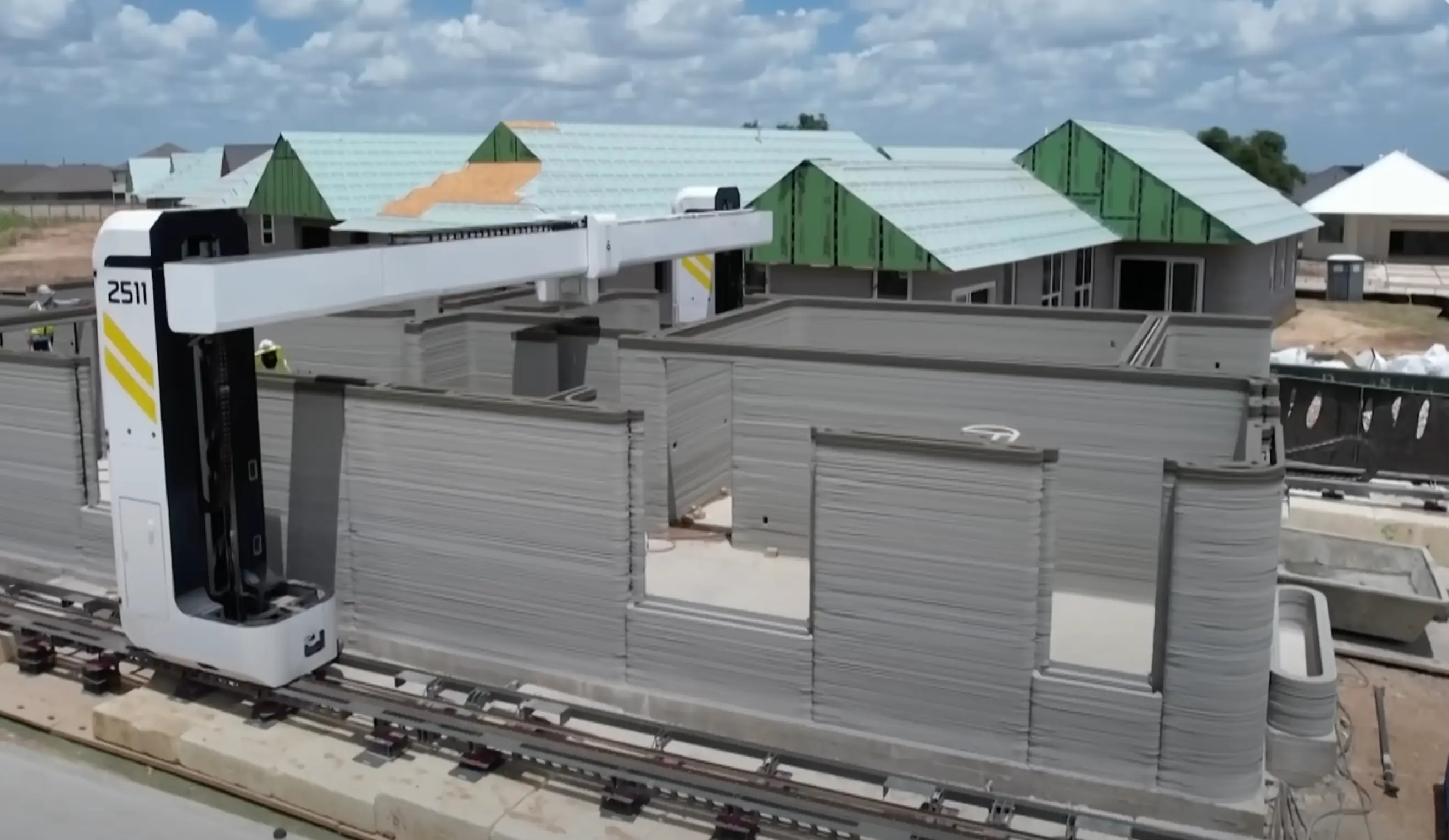 The homes are being built by a robotic printer (YouTube/@telegraph)