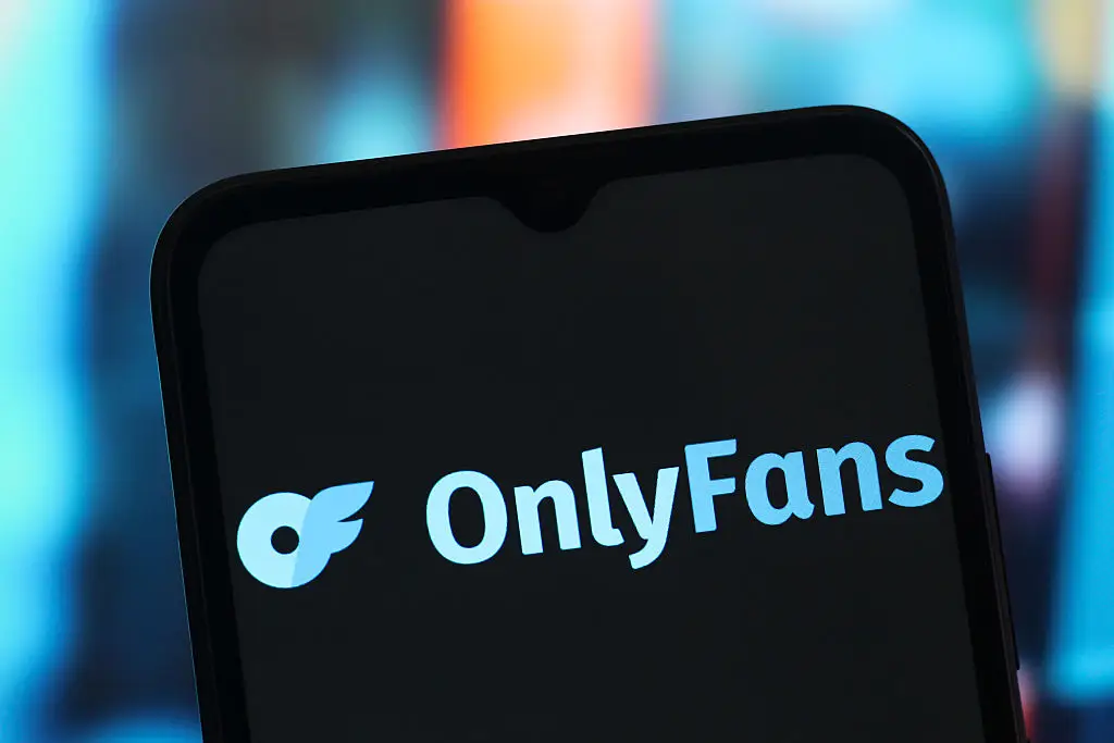 OnlyFans has a strict ID verification process that confirms that all users are over the age of 18 (Thomas Fuller/SOPA Images/LightRocket via Getty Images)