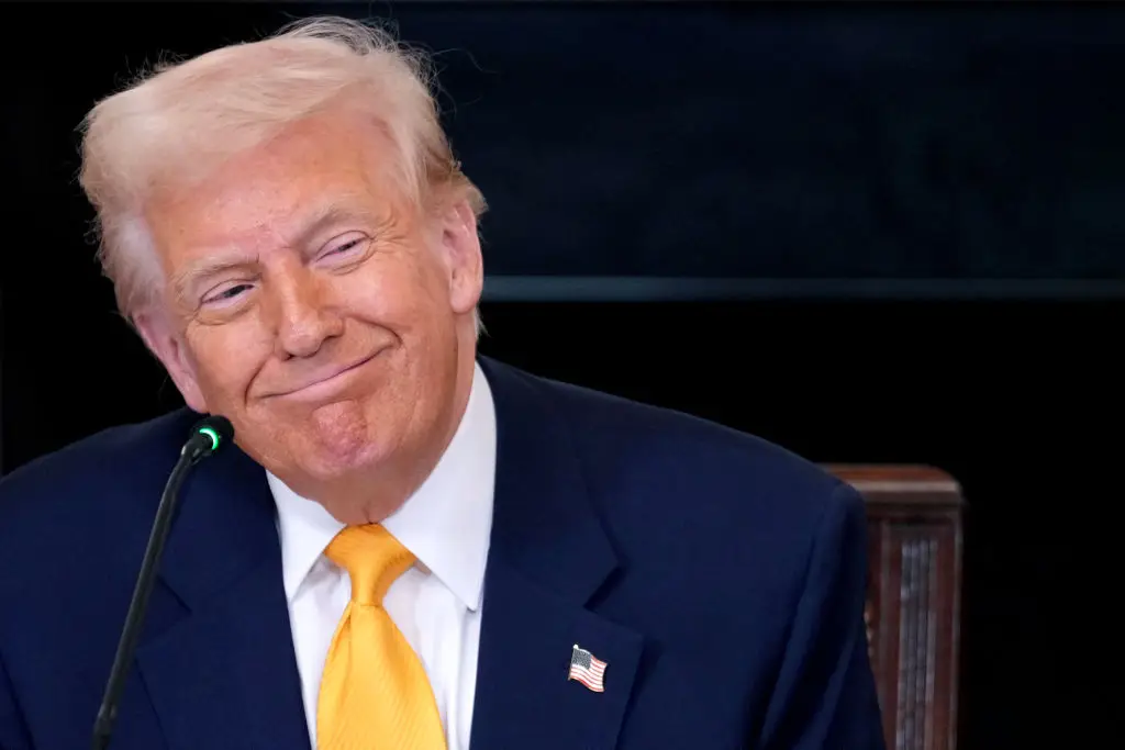 President Trump's controversial tariffs have caused his meme coin's price to tank (Chris Kleponis/CNP/Bloomberg via Getty Images)