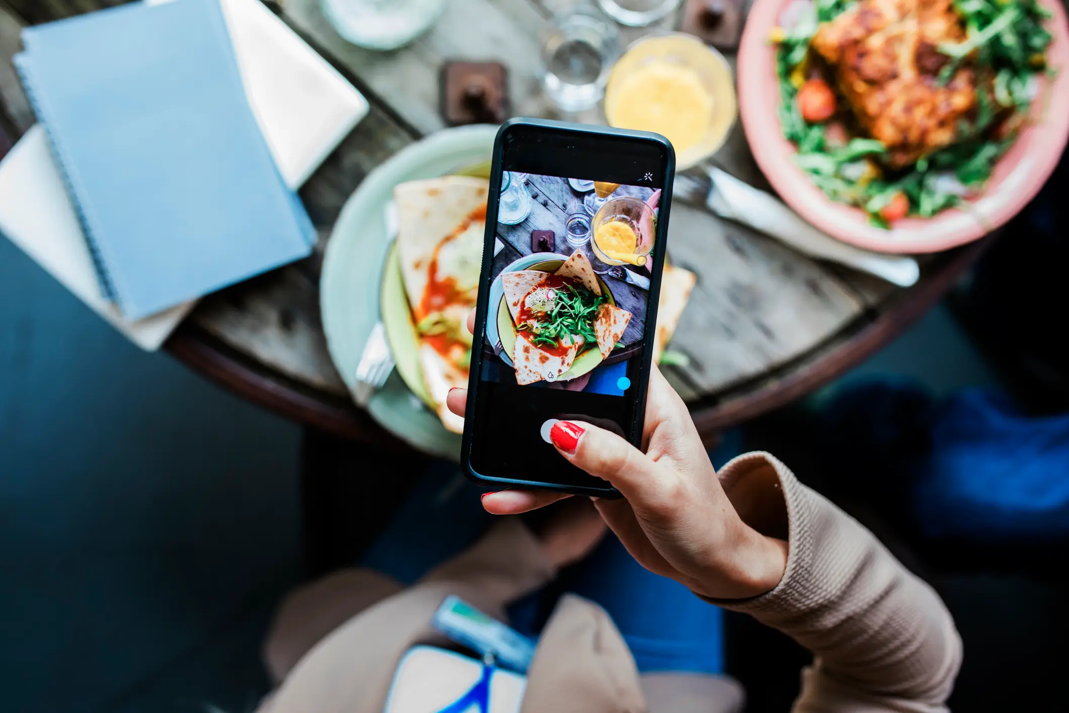 Many people update social media with food pictures (Hinterhaus Productions/Getty Images)