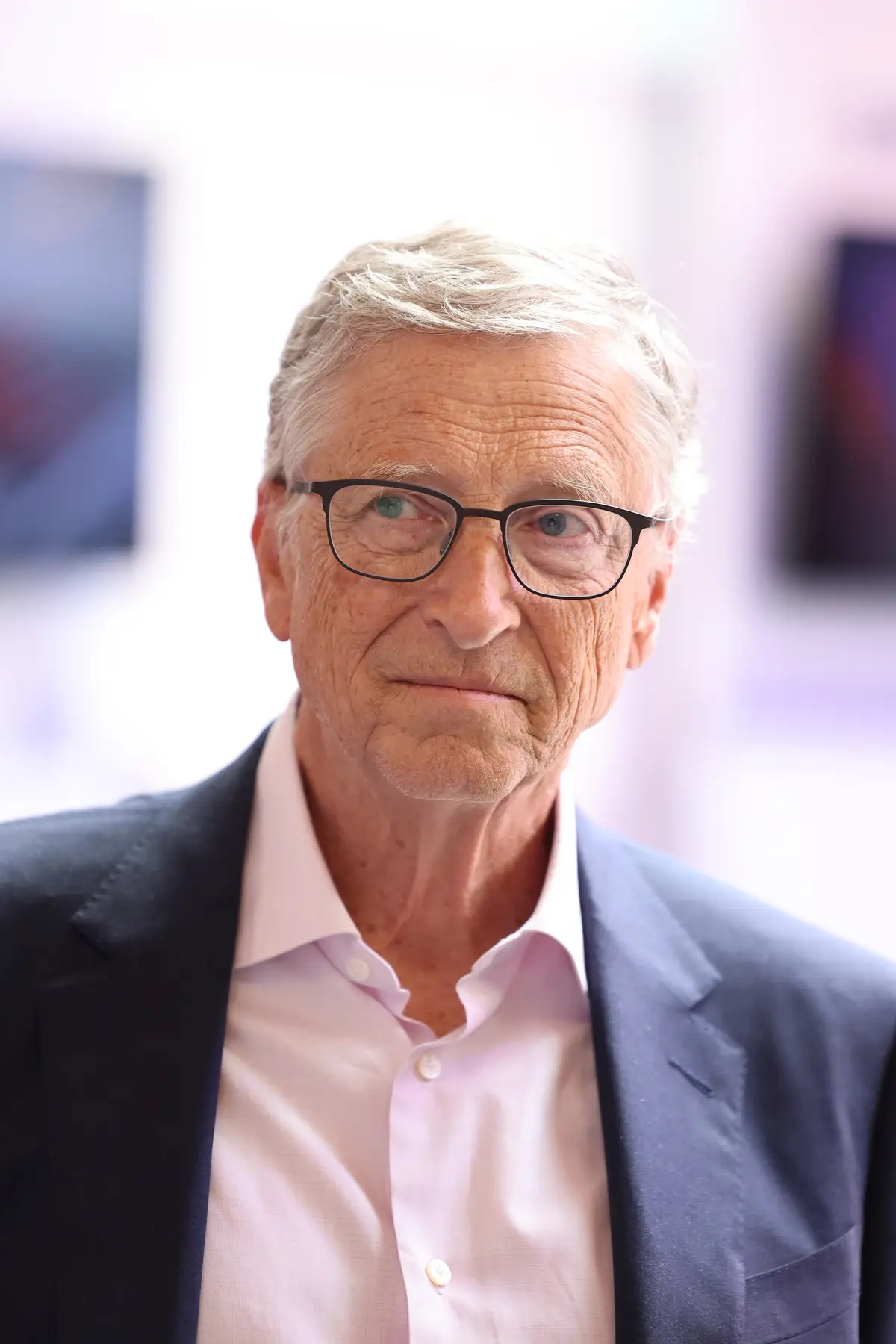 In it, Gates laughed of the theory that he's a reptile while talking about misinformation with his daughter Phoeve (NurPhoto/Contributor/Getty Images)