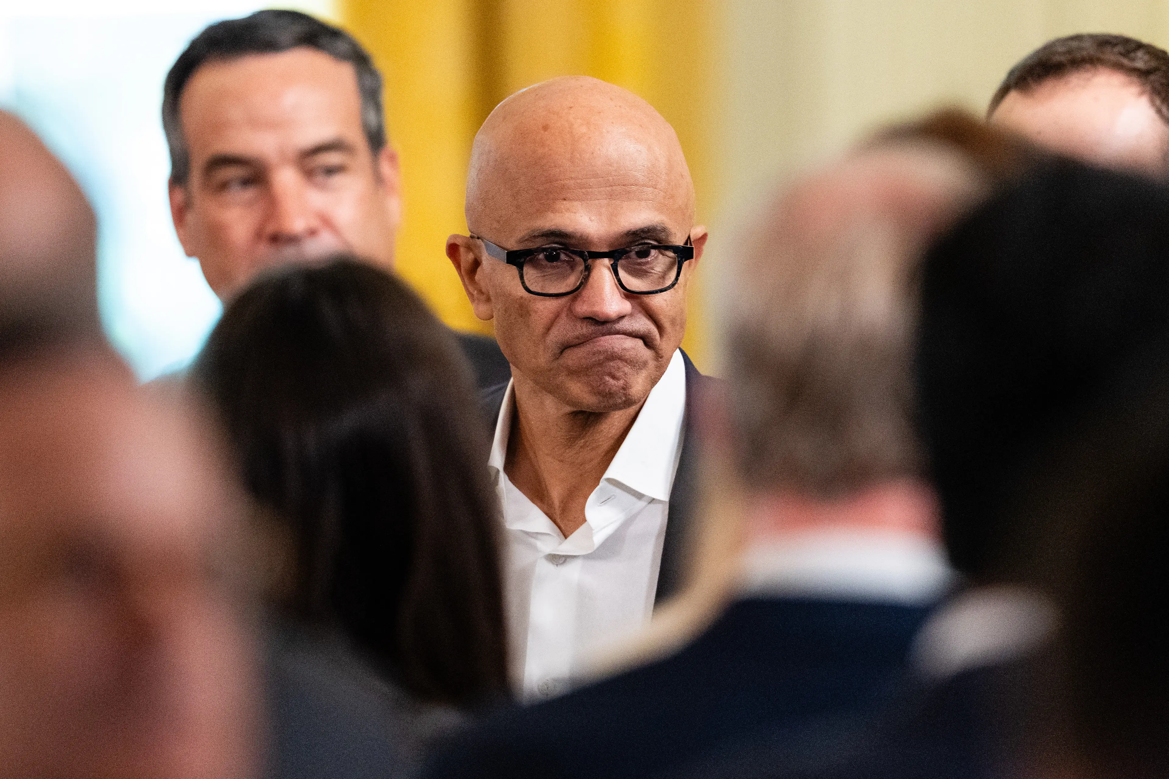 Microsoft invested $1 billion in OpenAI in 2019 under Nadella's leadership (Bloomberg / Contributor via Getty)
