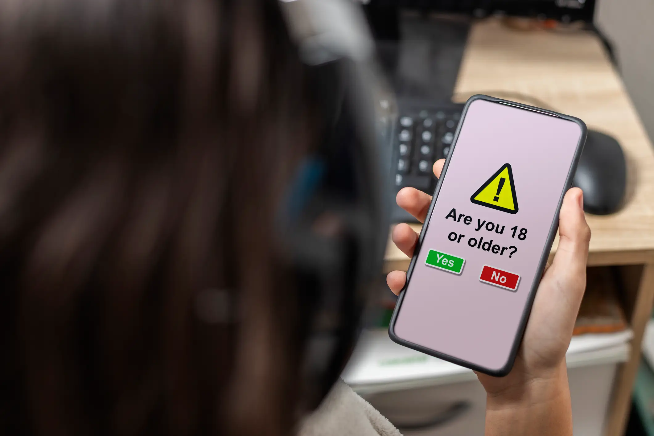 UK users will need to verify their age before accessing certain apps and services on iPhone (Nando Vidal/Getty)