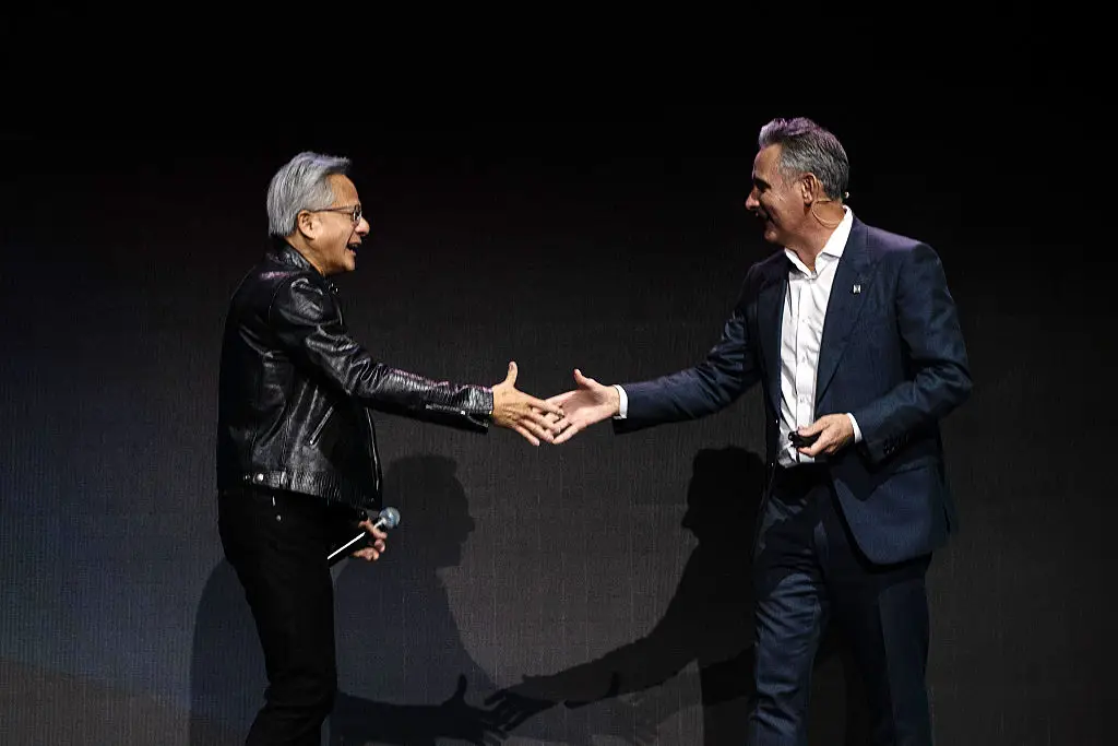 Huang took to the stage with Marvell's Matthew Murphy, praising the company with a bold prediction (Lam Yik Fei/Bloomberg via Getty Images)