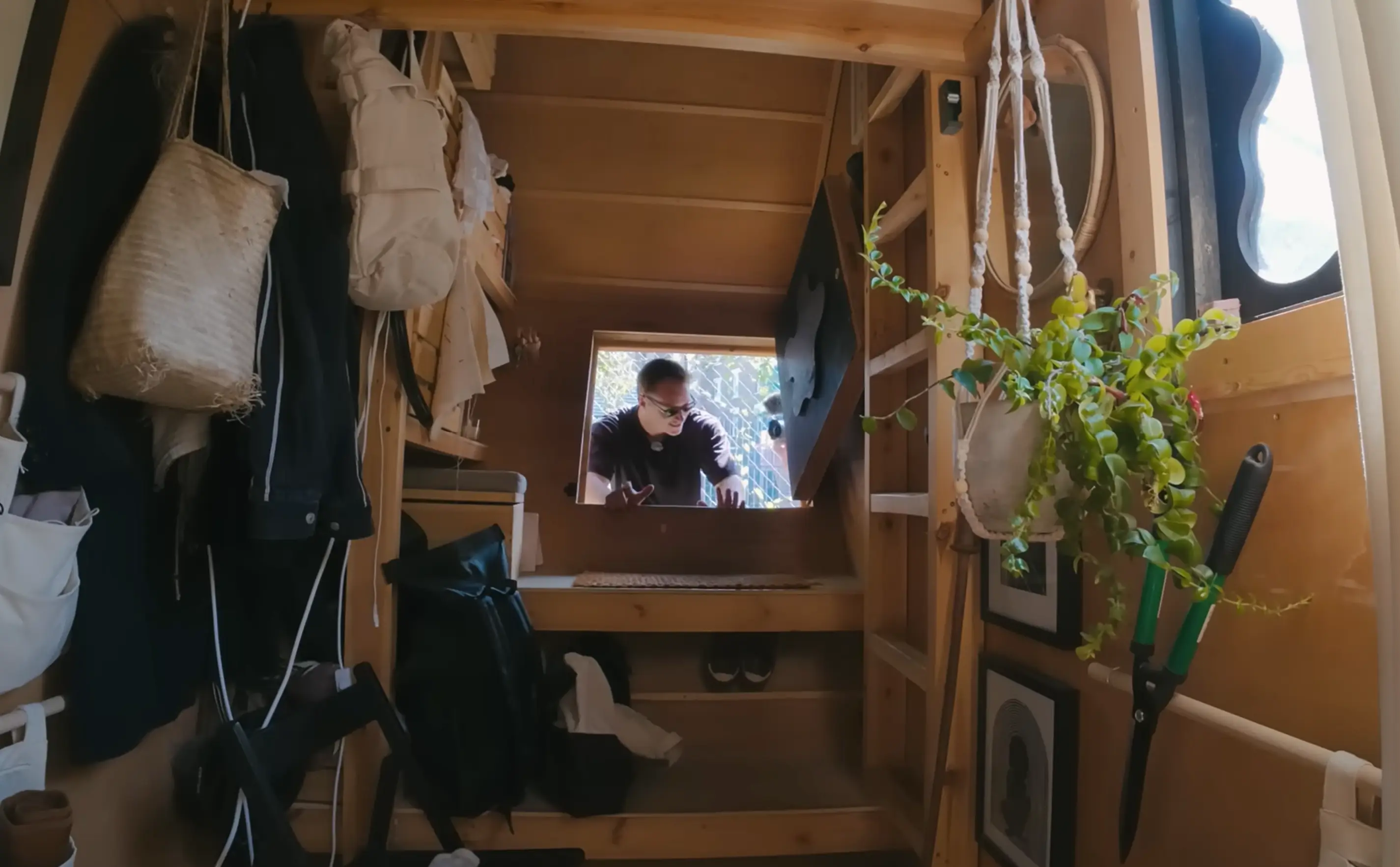 Harrison lives on top of a literal dumpster. (Drew Binsky/YouTube)