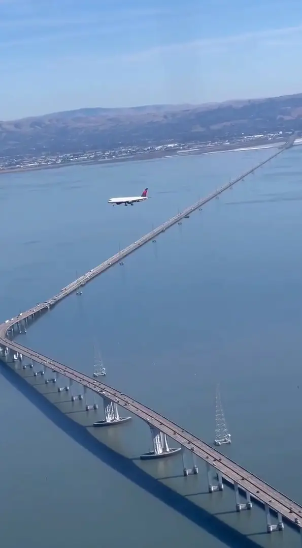 The airplane looks to be frozen in mid-air.