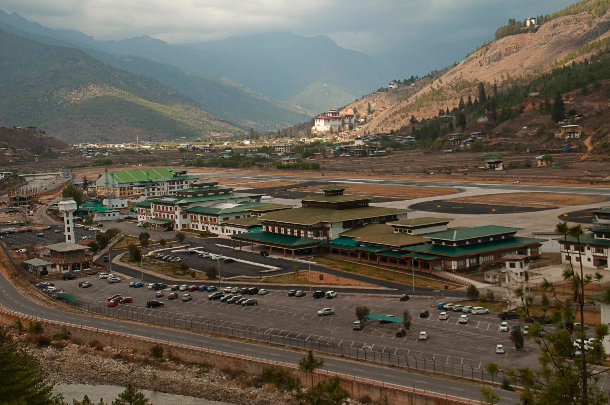 Paro International Airport is nestled between picturesque mountains (Getty Images)