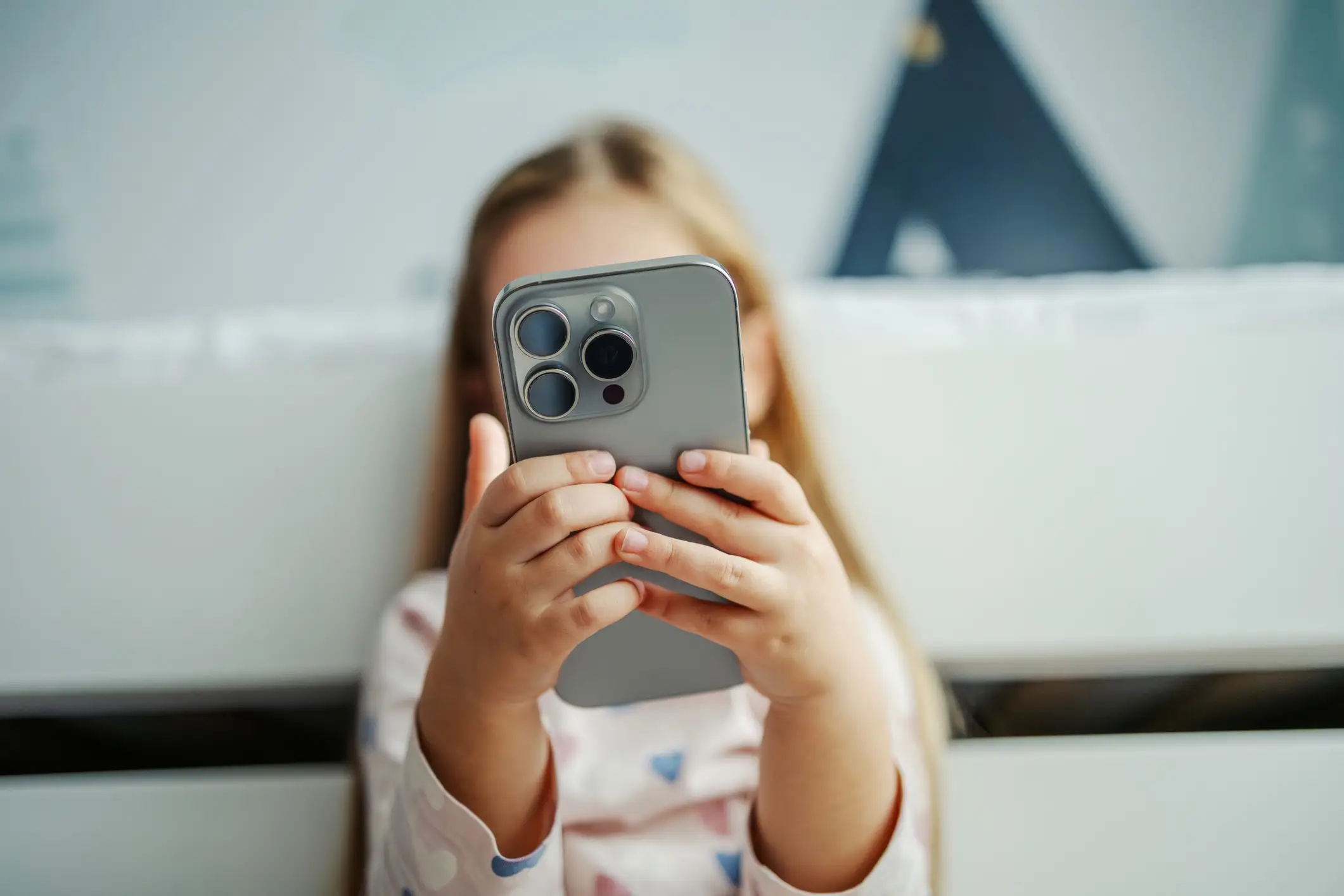Parents are urged to prepare their children for the execution reaching their phones (Organic Media/Getty Images)