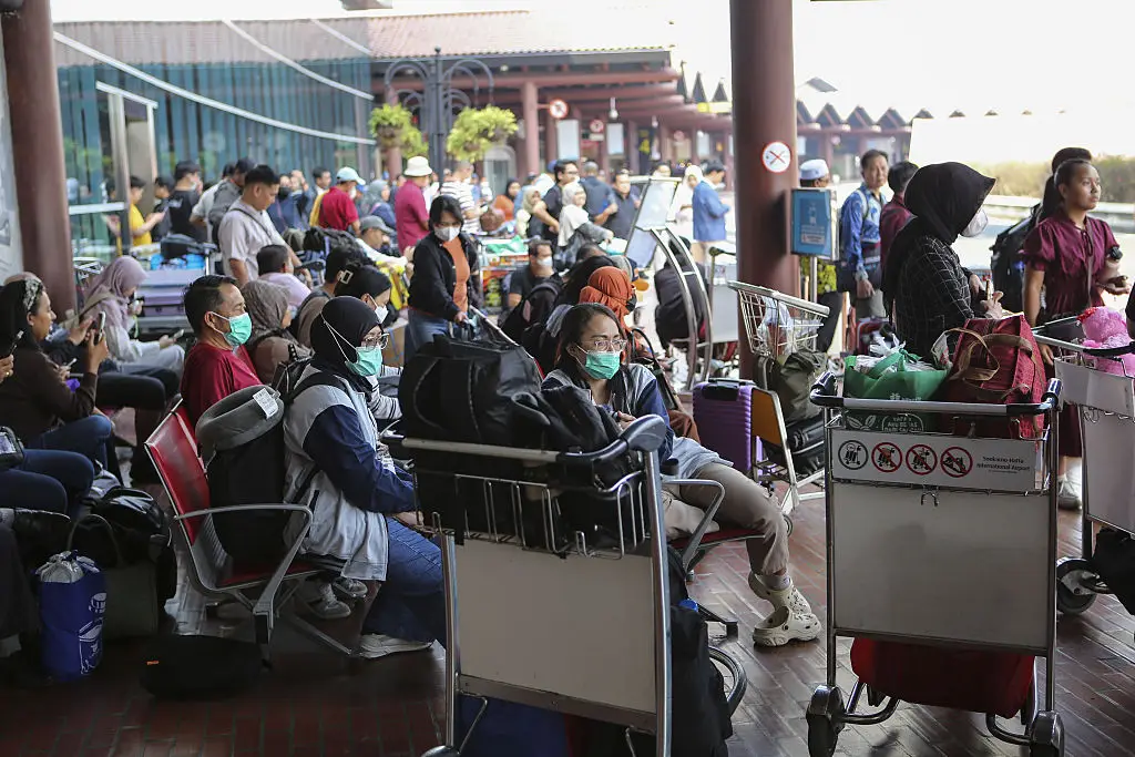 Passengers have been left stranded as flights are grounded (Agoes Rudianto/Anadolu via Getty Images)
