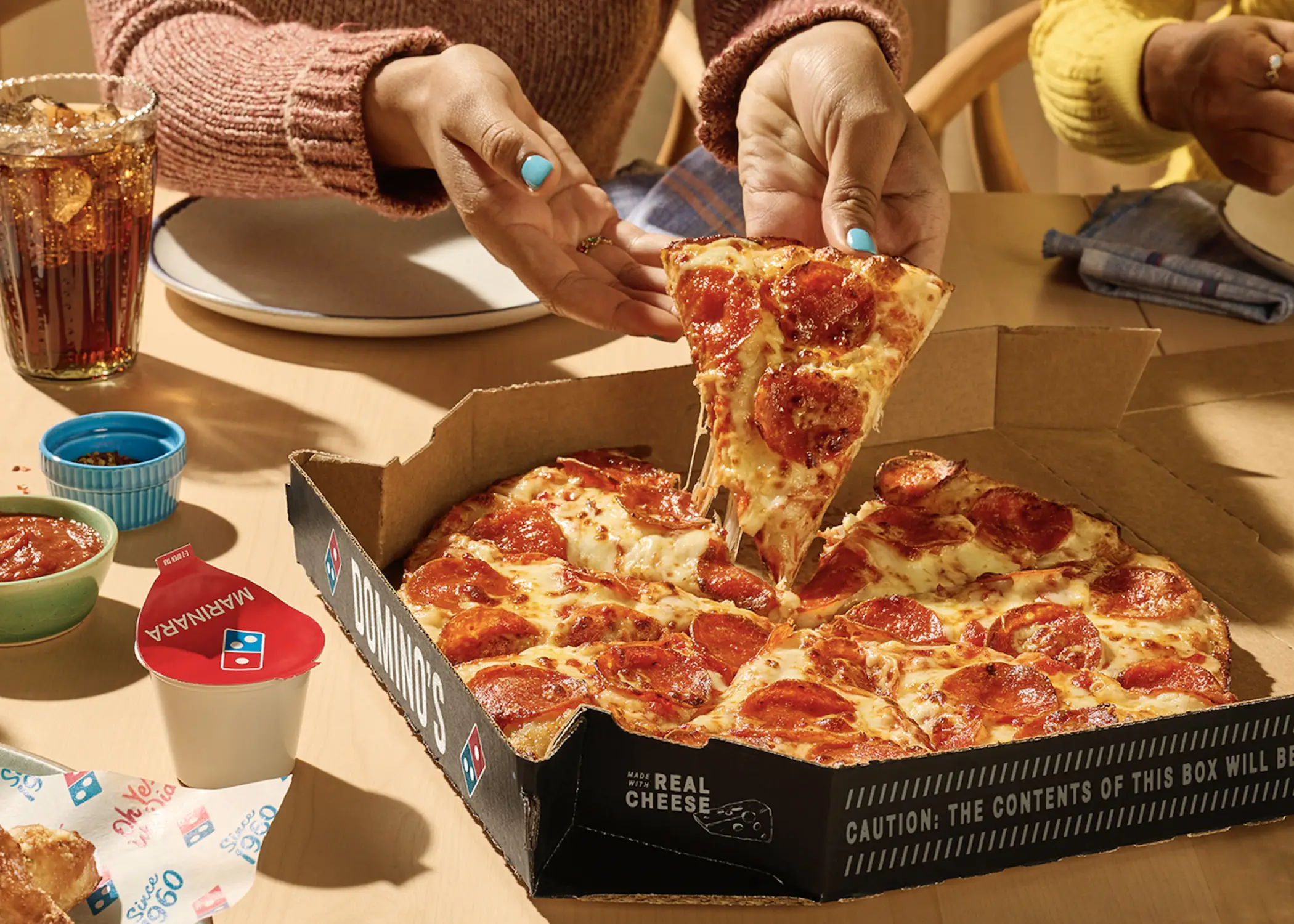 The global pizza chain has redesigned its website and mobile app (Domino's Pizza)