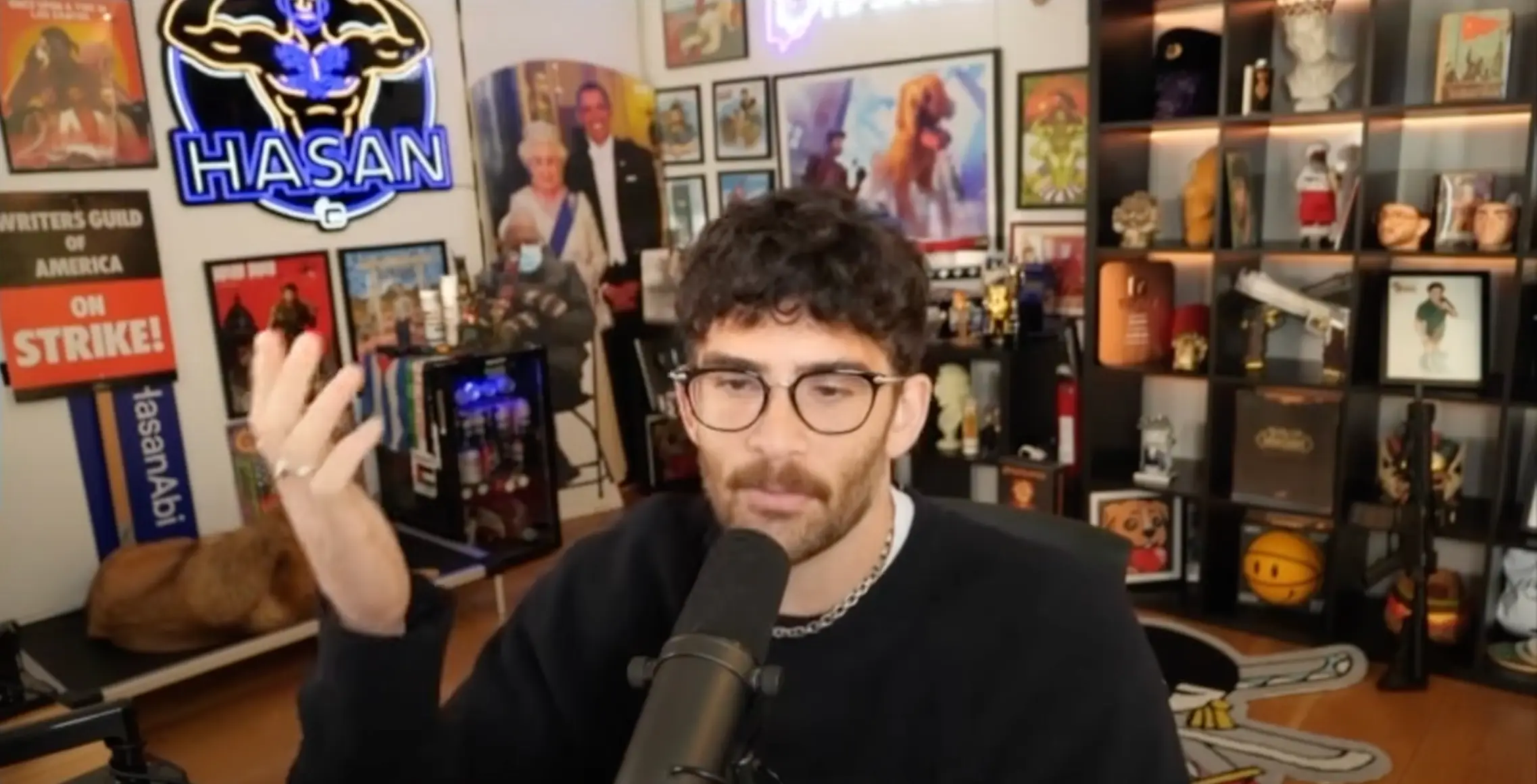 The political streamer claims he was detained at an airport by ICE agents (YouTube/@H4sanDaily)