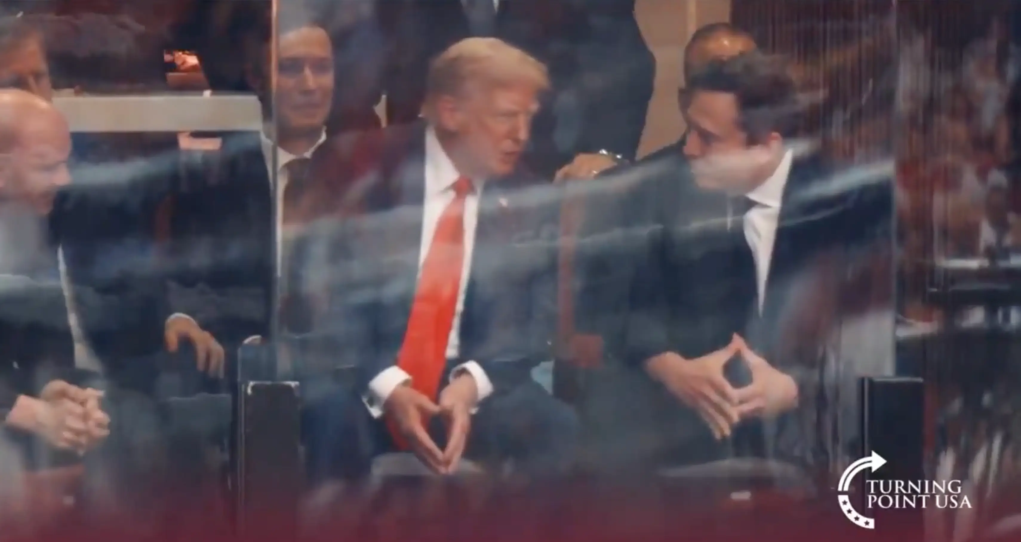 Trump and Musk were spotted talking at Charlie Kirk's memorial (Rumble)