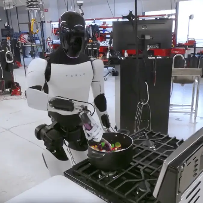 Eerie footage showing Tesla's humanoid robot 'cooking dinner' is leaving people mind-blown