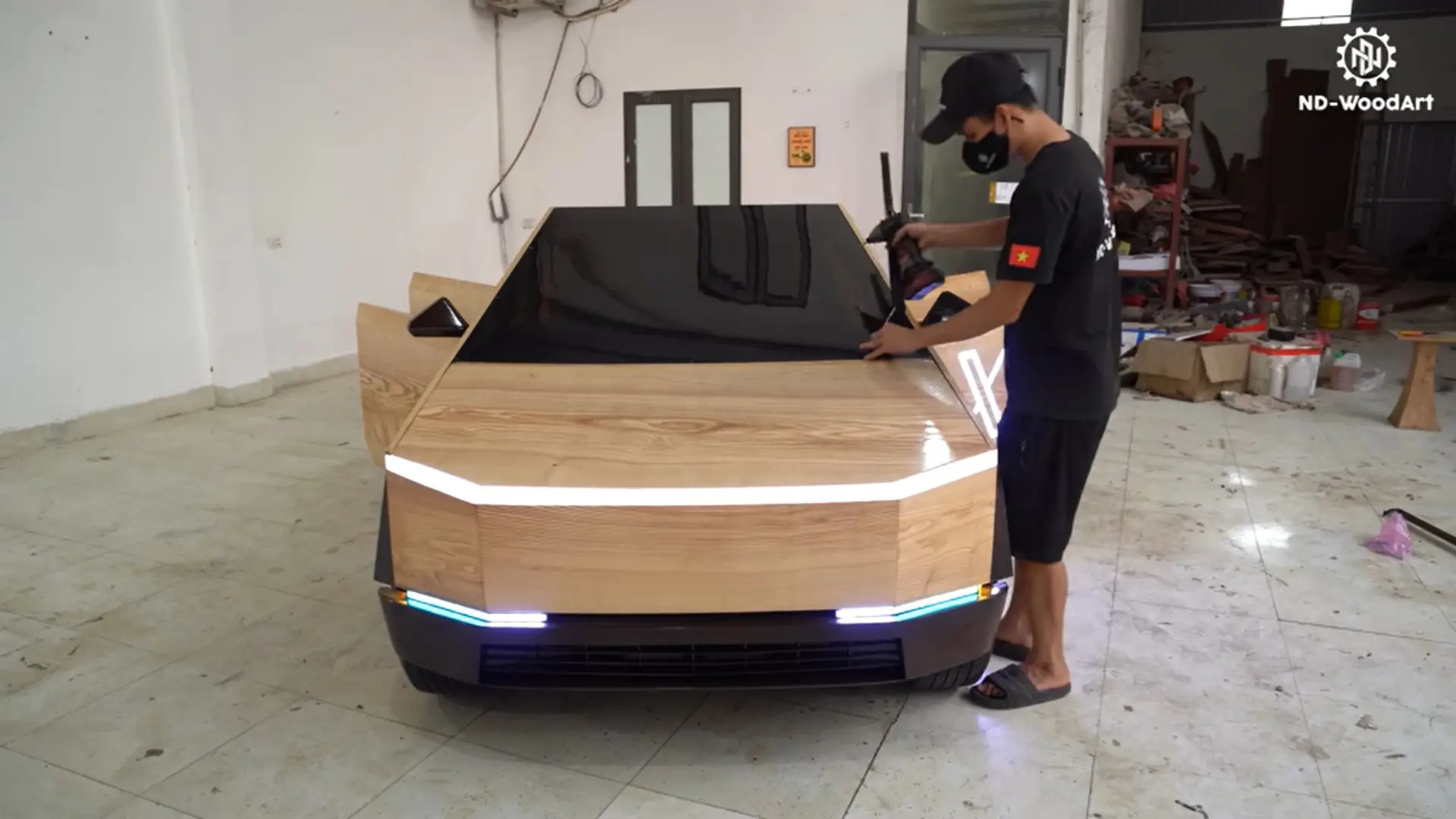 The car has the 'X' logo on the side.