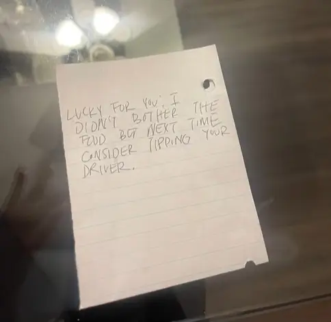 The DoorDash driver left a less than complimentary note.