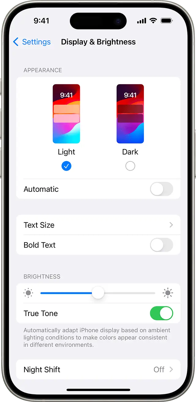 Opting for lower brightness and dark mode can make a surprising difference for your iPhone's battery (Apple)