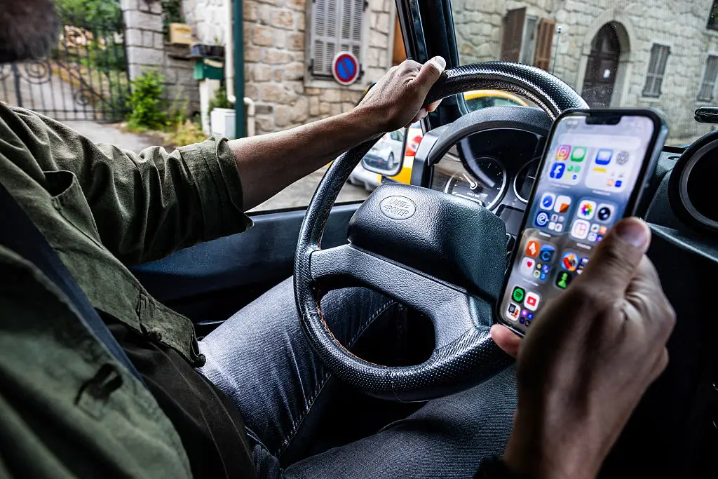 While it could cut down on people using their phone while driving, it raises concerns about privacy (Grichka Beysson-Leandri/Hans Lucas/AFP via Getty Images)