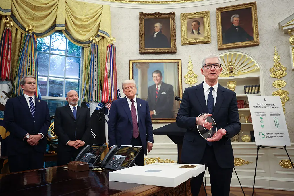 Cook will take on a more diplomatic-facing role as Executive Chairman, dealing with political figures like Donald Trump (Win McNamee/Getty Images)