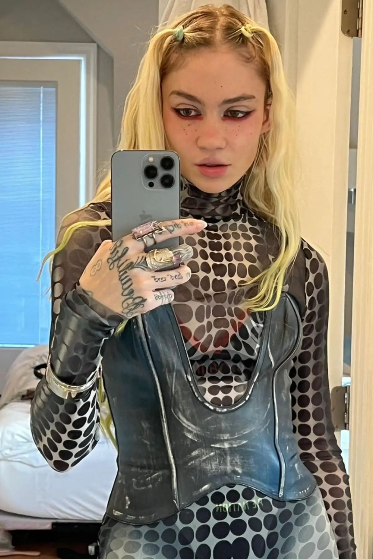 Grimes has been defended by her mother. (grimes/Instagram)