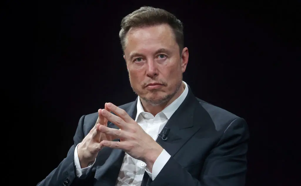 Musk would immediately earn as much as $824 billion as a 'loophole' in his agreement with Tesla renders the conditions complete upon sale (Chesnot/Getty Images)