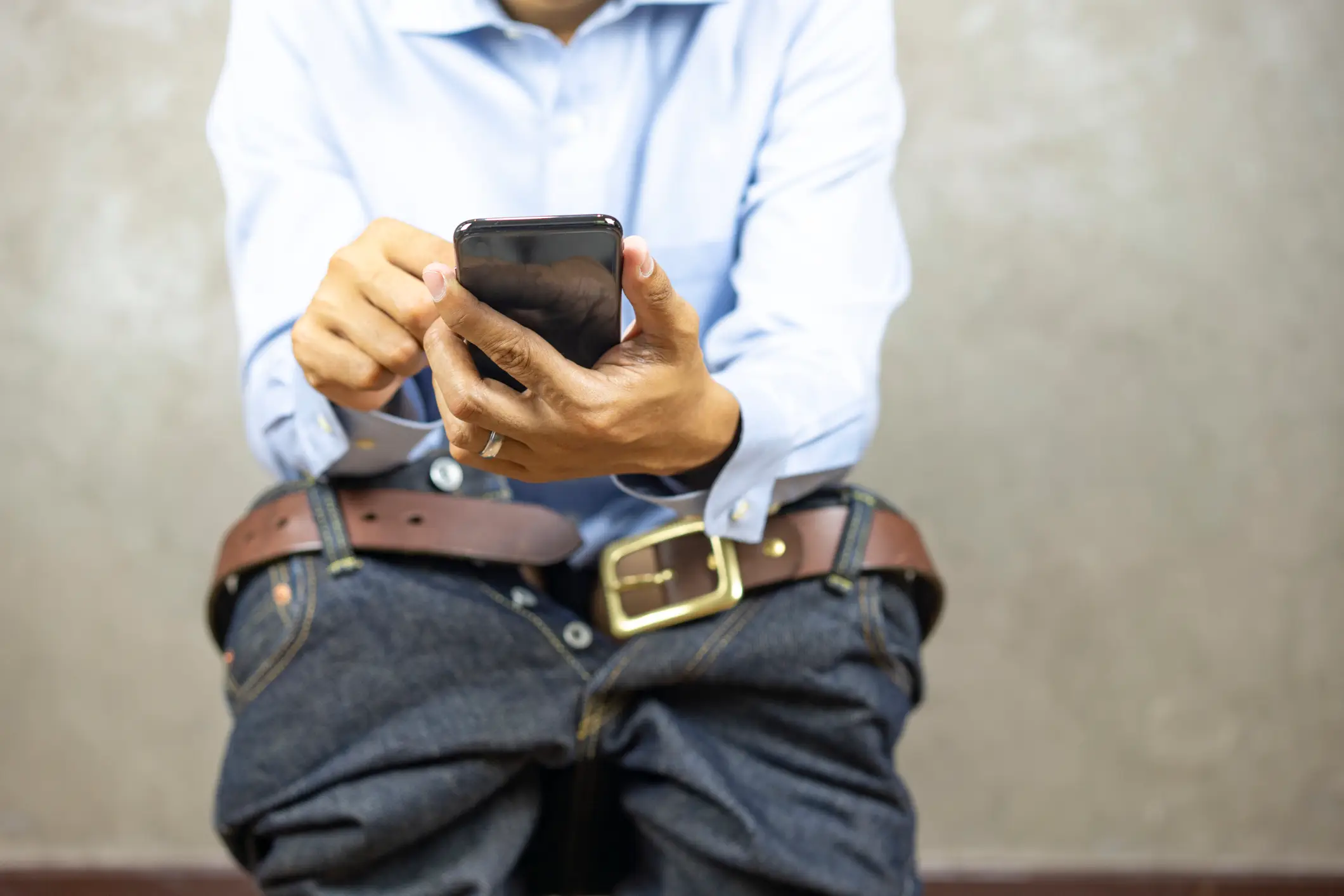 Scrolling away actually increases your risk of hemorrhoids by 46 per cent according to a new study (Getty Stock)