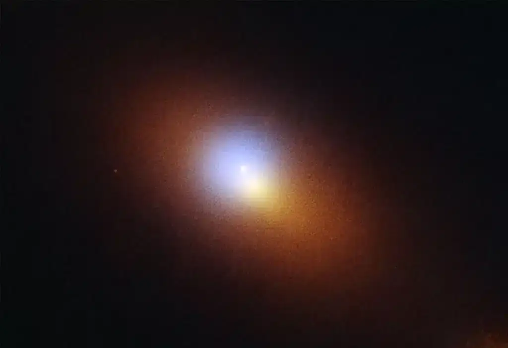 Scientists have speculated the origin of this deadly 'invisible' black hole at the fringes of a host galaxy (NASA/ESA/STScl/Yuhan Yao/Joseph DePasquale)