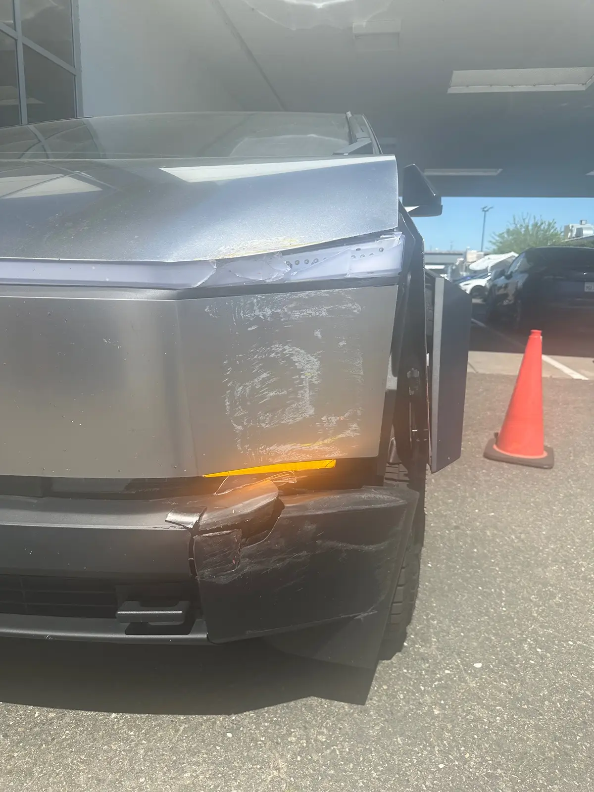 A post on a Cybertruck forum shows alleged damage.