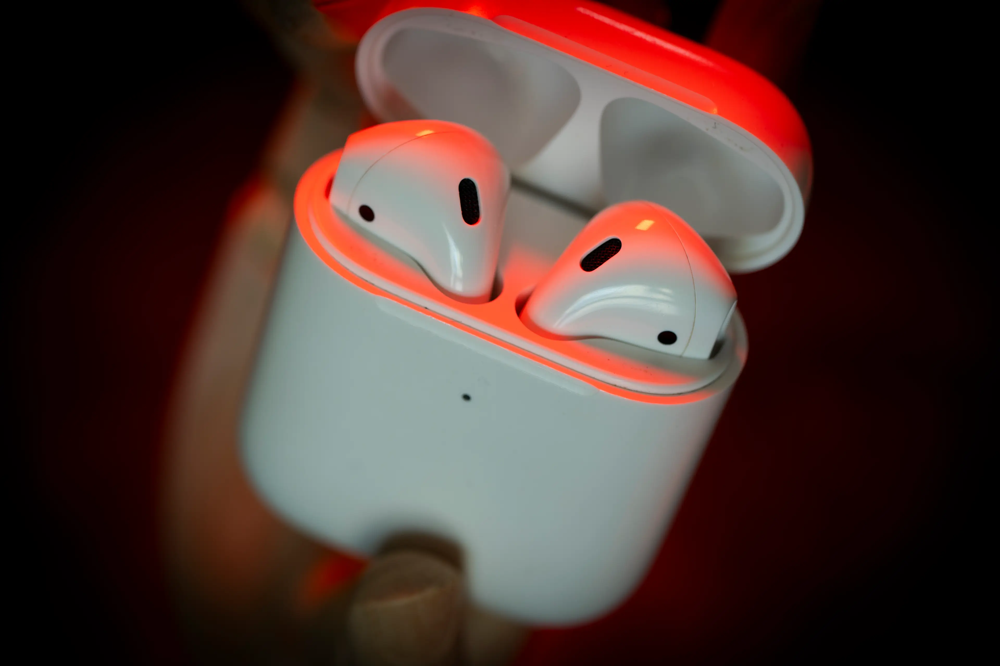 Apple AirPods in their case with Bluetooth connectivity (NurPhoto / Getty)