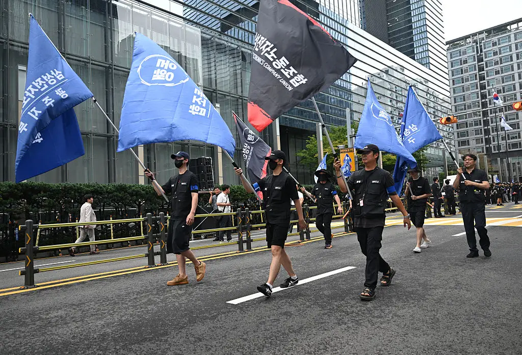 Taking action via a union is incredibly strong, but can backfire if your fellow workers don't join you in standing strong (Jung Yeon-je / AFP via Getty Images)