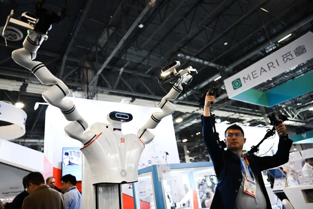 How could you not fall in love with these long arms? (Patrick T. Fallon/AFP via Getty Images)