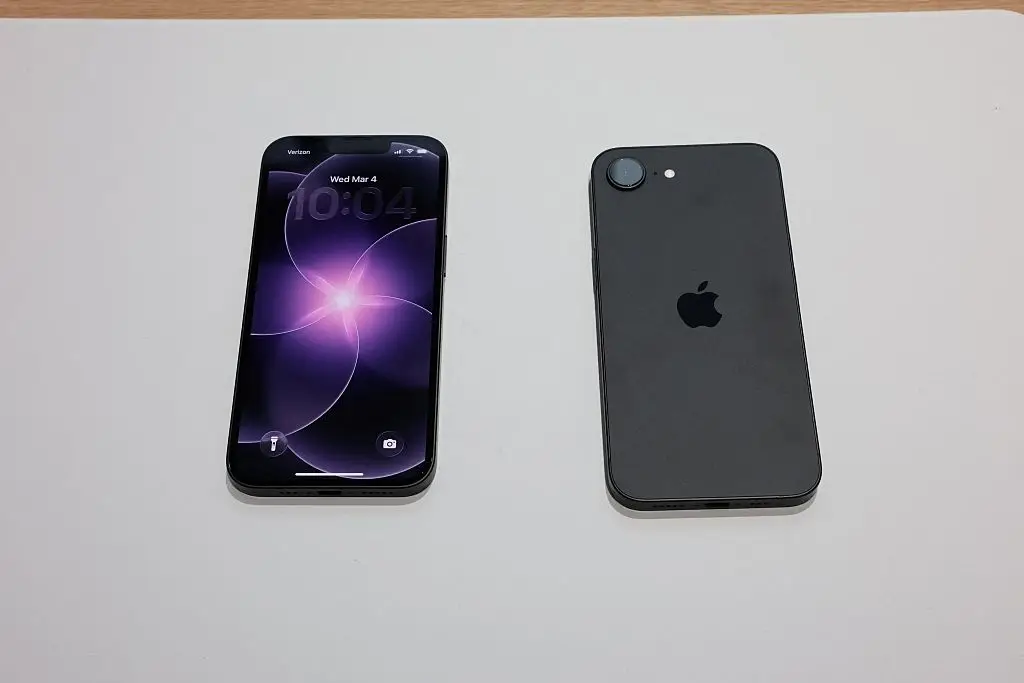 Budget phones like the iPhone 17e already operate on a small profit margin, with hardware price hikes forcing companies to pass the cost onto the consumer (Timothy A. Clary/AFP via Getty Images)