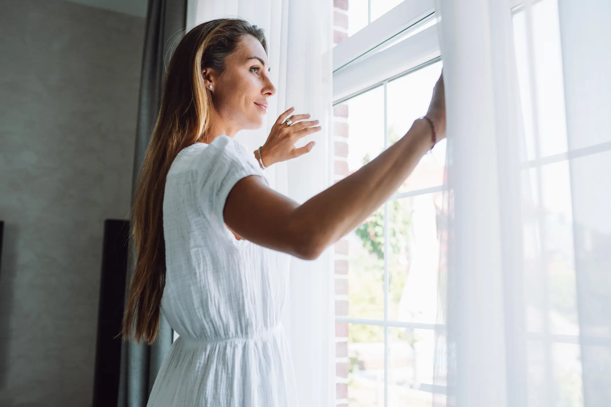 Opening your windows at the wrong time could be making your house hotter (Olga Rolenko/Getty)