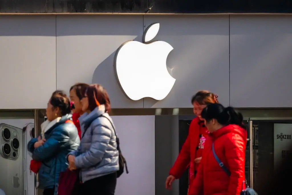 You might be able to earn yourself $20 for simply owning an Apple device in the last decade (Cheng Xin/Getty Images)