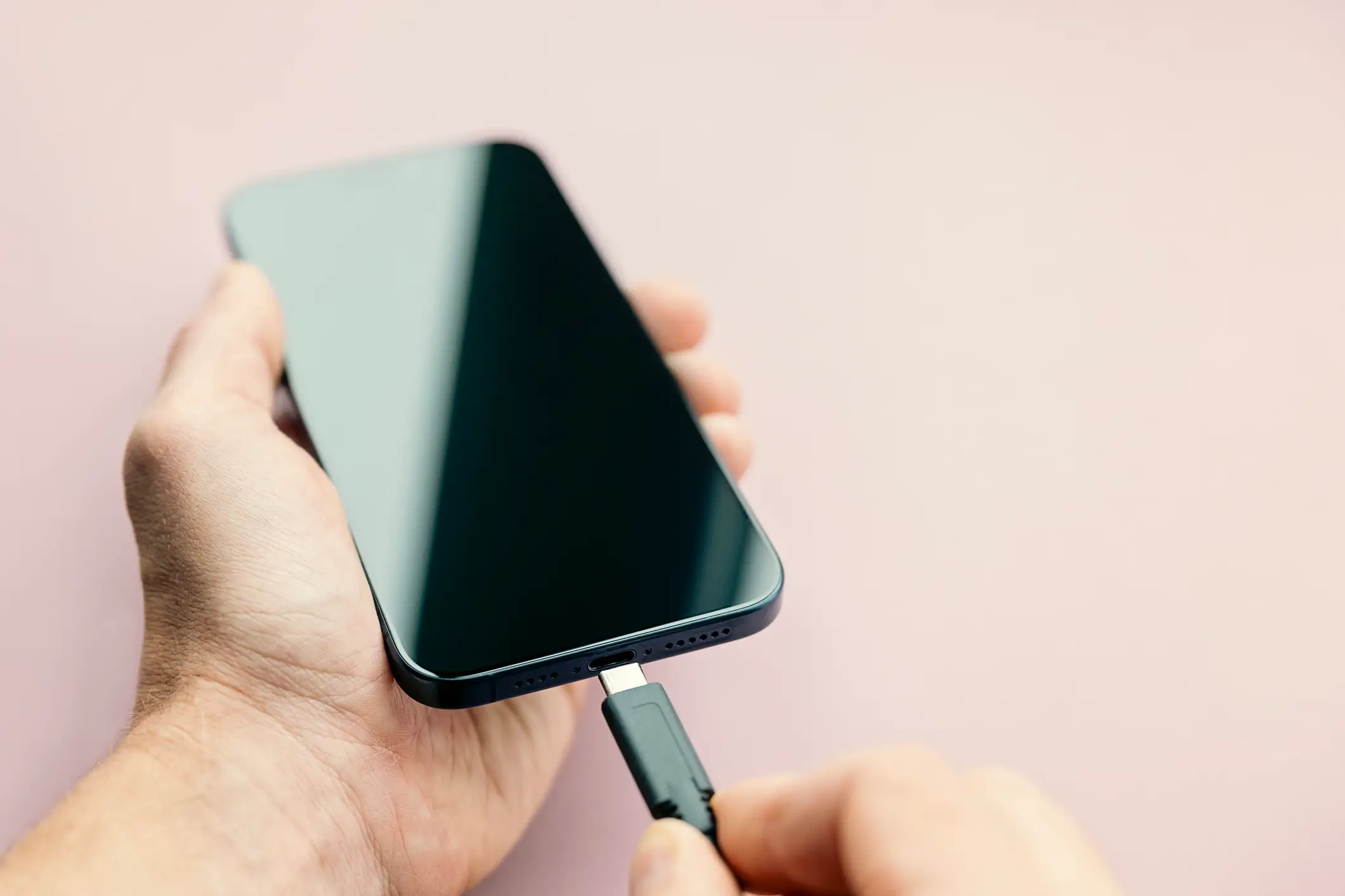 Charging your phone overnight isn't actually as harmful as you might think (Getty Stock)