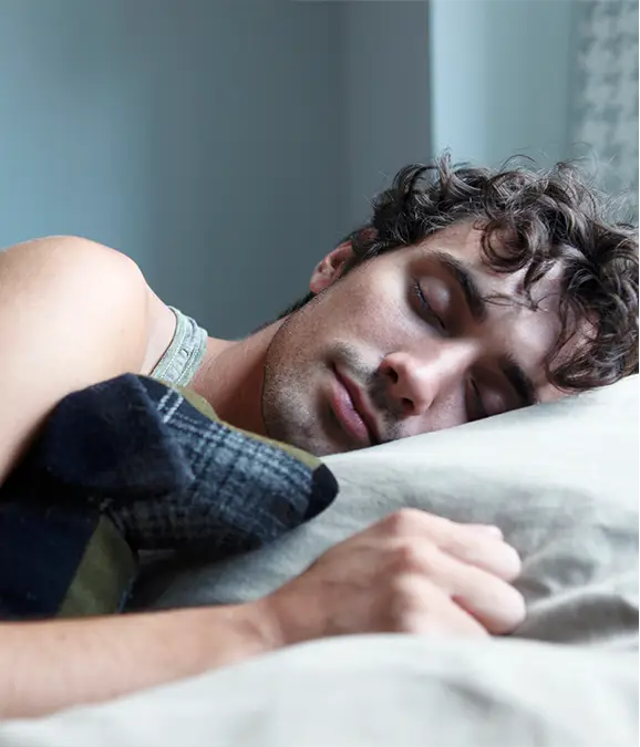 Ditch the snooze alarm to avoid an afternoon slump /Tim Kitchen/Getty