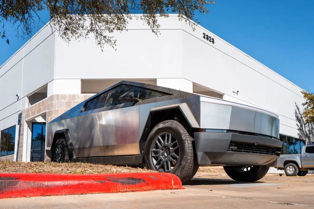 Cybertruck owners have reported glued on parts peeling off from their cars (Brandon Bell/Getty Images)